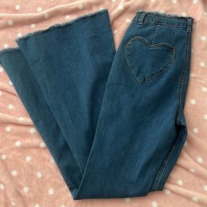 Flate Jeans with heart pockets, super flattering, never worn